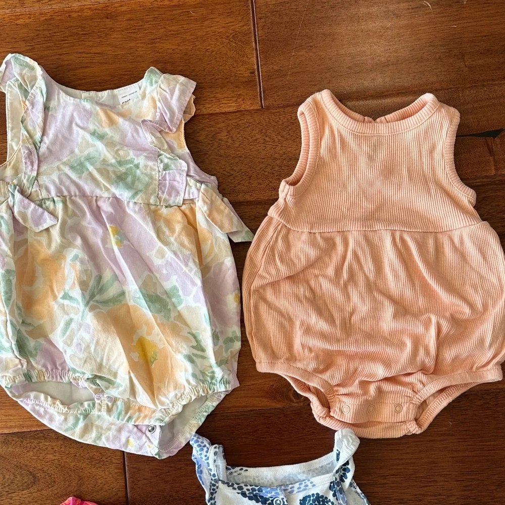 Baby Girl One Pieces in Pink, Peach, and Blue